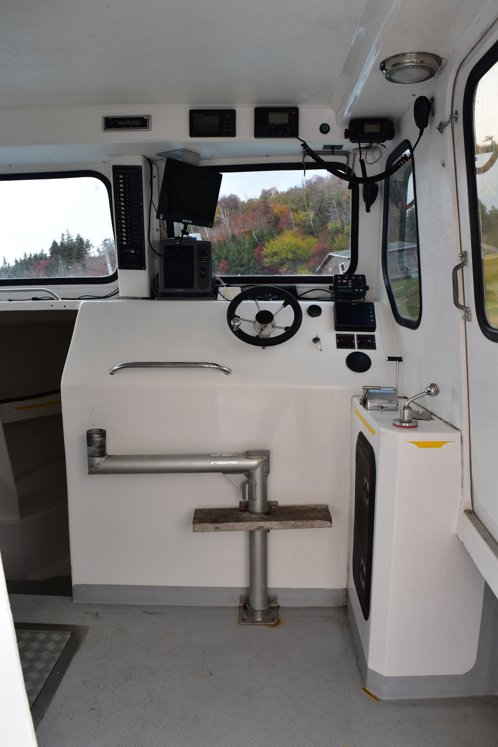 Interior of a vehicle with a stove and dashboard view