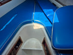 Close-up of a boat's blue interior with white trim